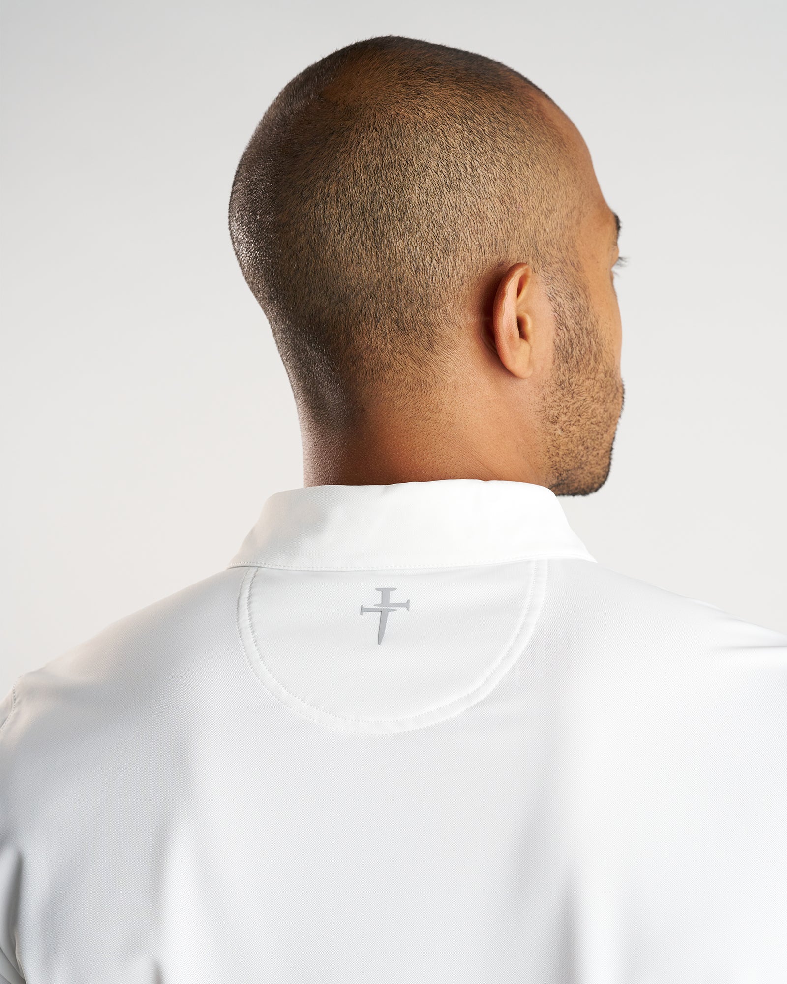 Vented Tech Polo “Three Nails” - White